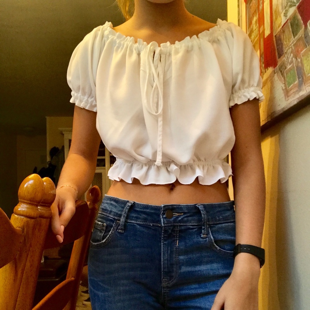Cropped white shirt; can be worn off the shoulders